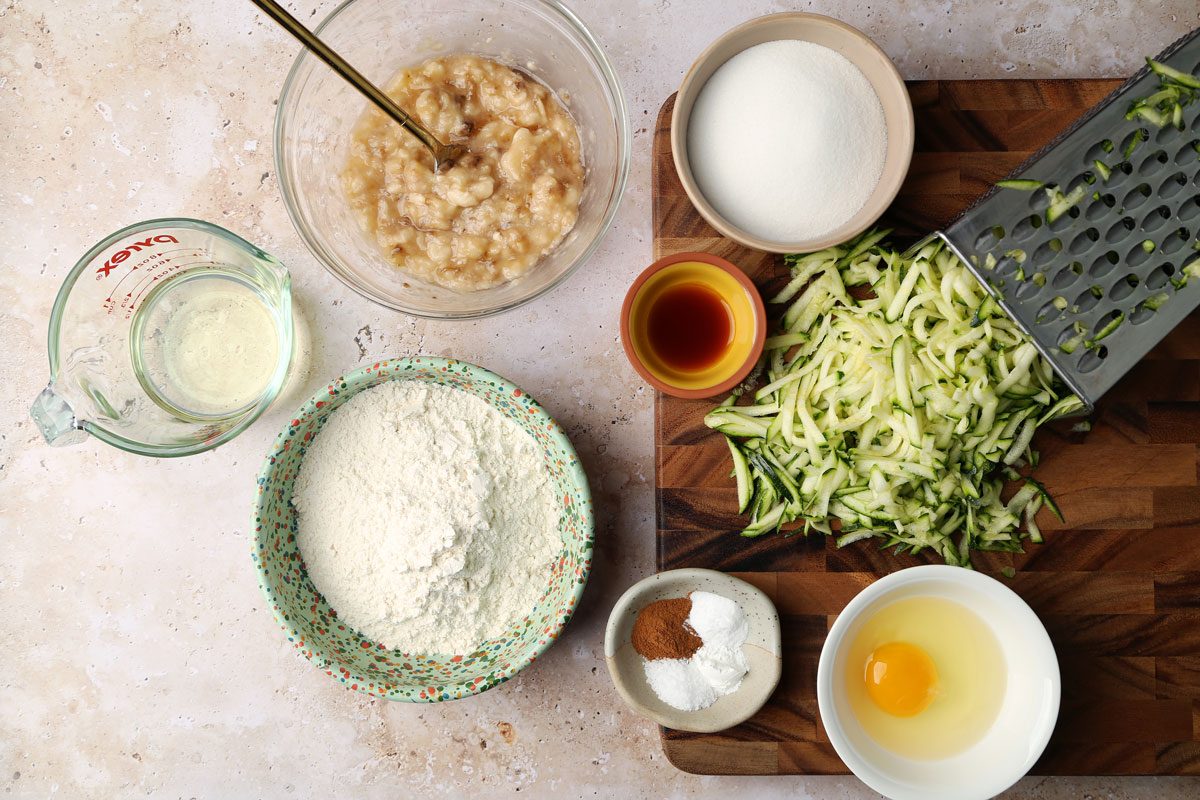 Ingredients laid out in various bowls for Taste of Home's Banana Zucchini Muffins.