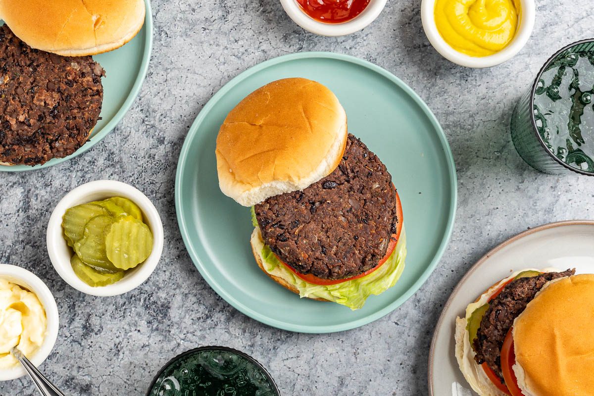 Taste of Home Black Bean Burger recipe photo of the finished recipe served with condiments.