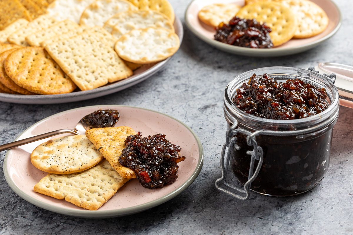 Taste of Home Bourbon Bacon Jam recipe photo of the finished recipe served with crackers.