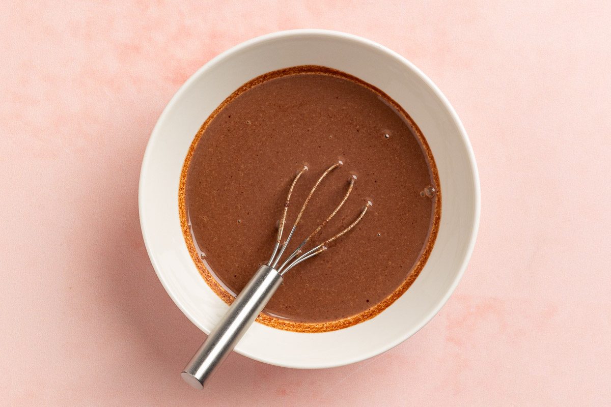 Taste of Home Chocolate Bread Pudding photo of the melted chocolate mixed with cream in a bowl.