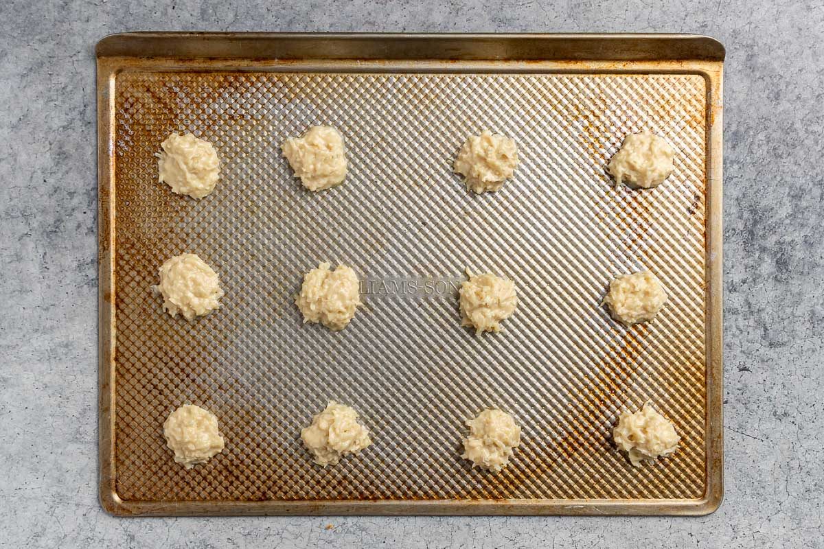 Taste of Home Coconut Macaroons recipe photo  of dough portioned out into balls and set on a cookie sheet.