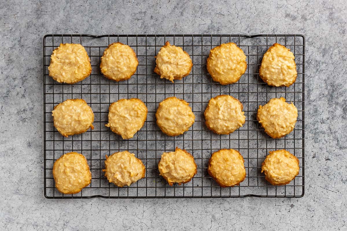 Taste of Home Coconut Macaroons recipe photo  of cookies baked and resting on a wire rack.