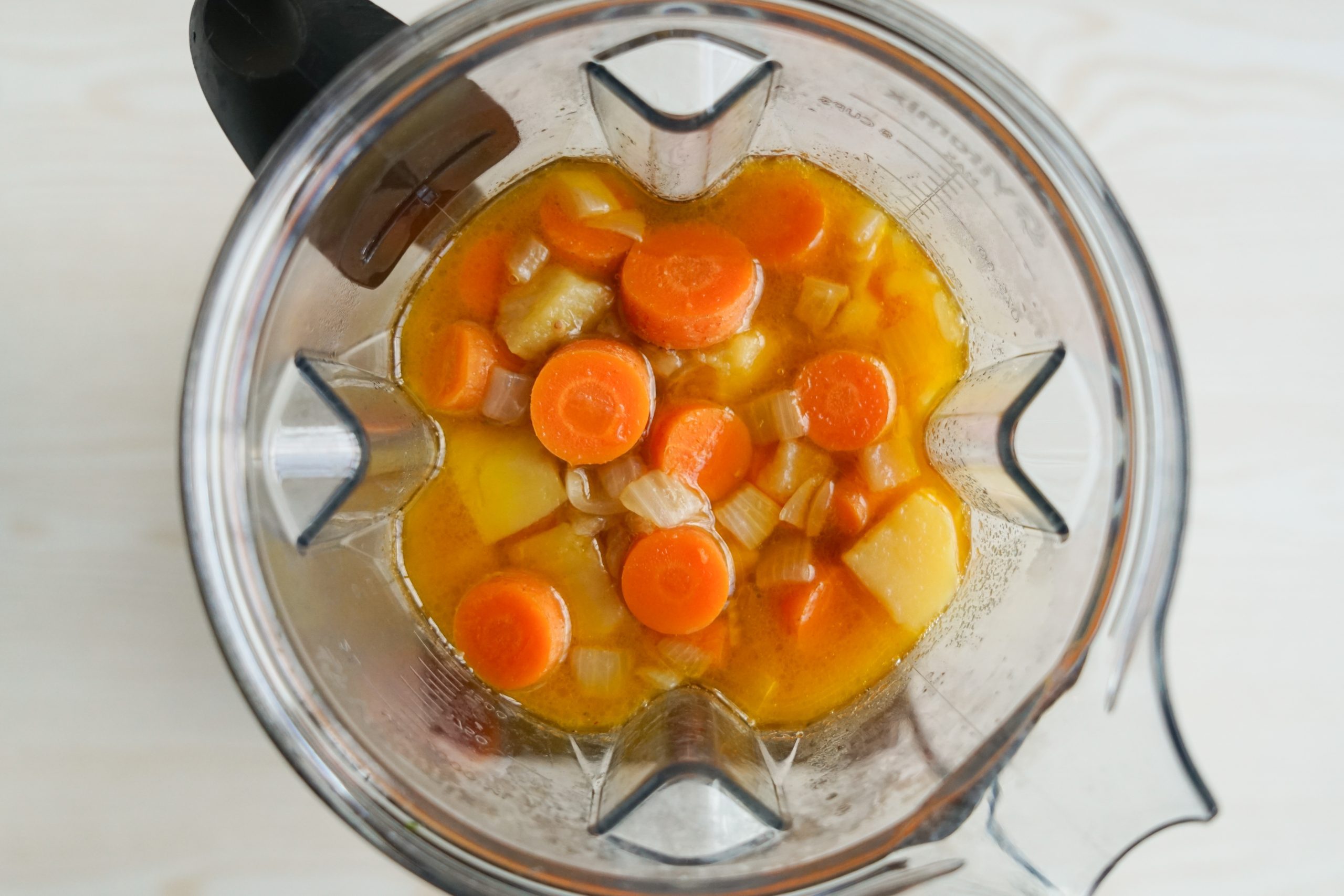 Blending creamy carrot soup