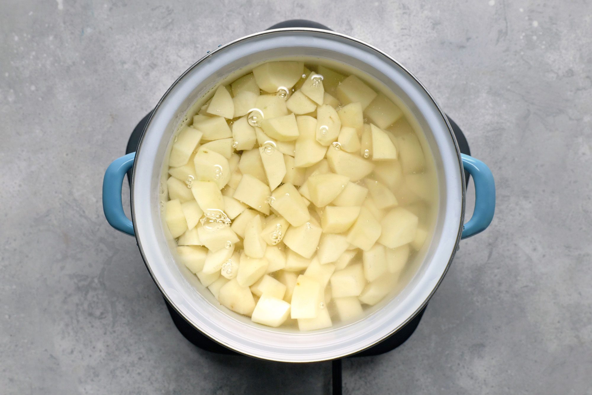 Place in a large stockpot boil chopped potatoes until tender