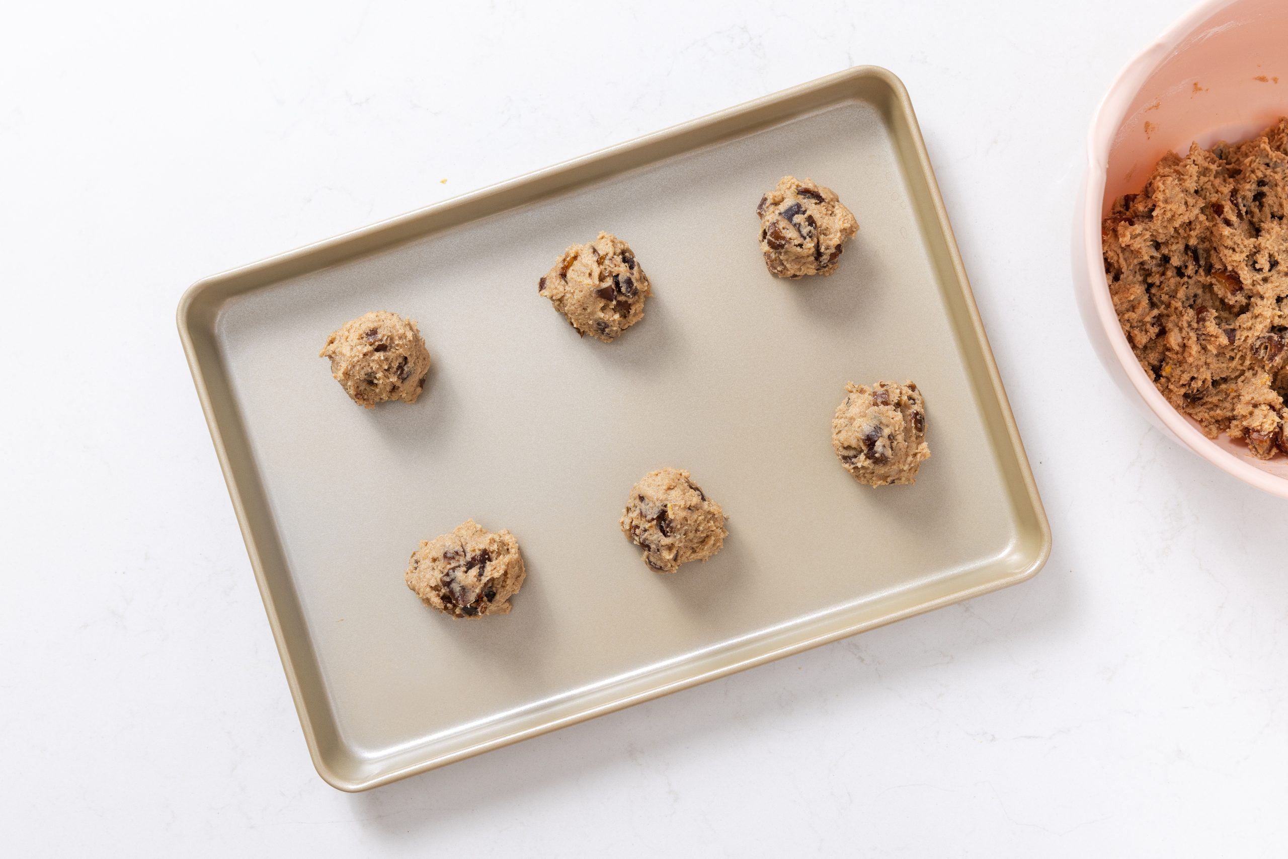 Cookies in baking sheet ready to be baked.