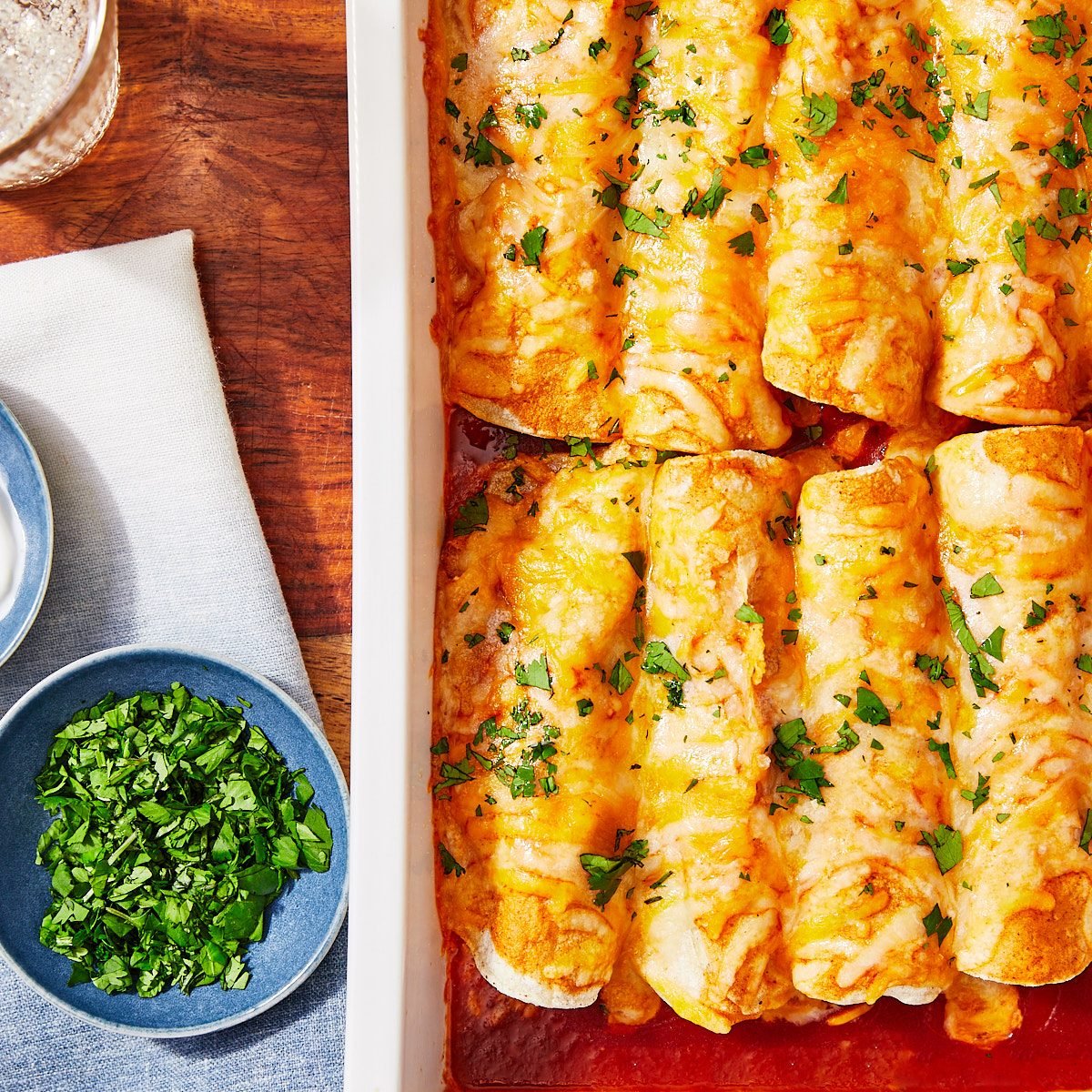 Smoky Sweet Potato And Black Bean Enchiladas Hero- enchiladas in 9x13 dish