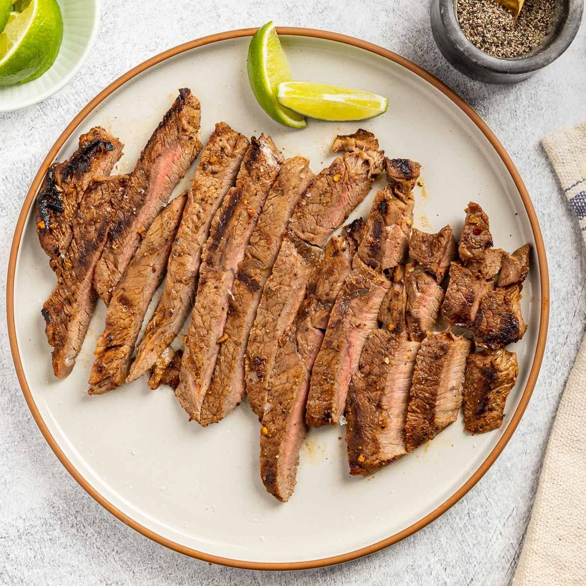 Taste Recipes Grilled Flat Iron Steak recipe photo of the finished recipe on a serving plate.