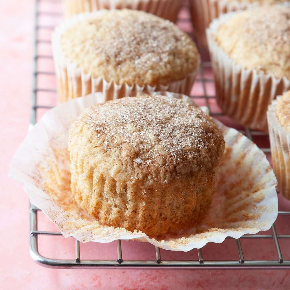 Close Up Of Taste Of Home Applesauce Muffins On A Cooling Rack