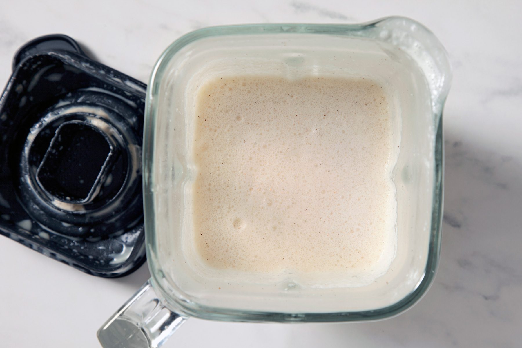 Top view shot of thickened ice cream mixture in blender