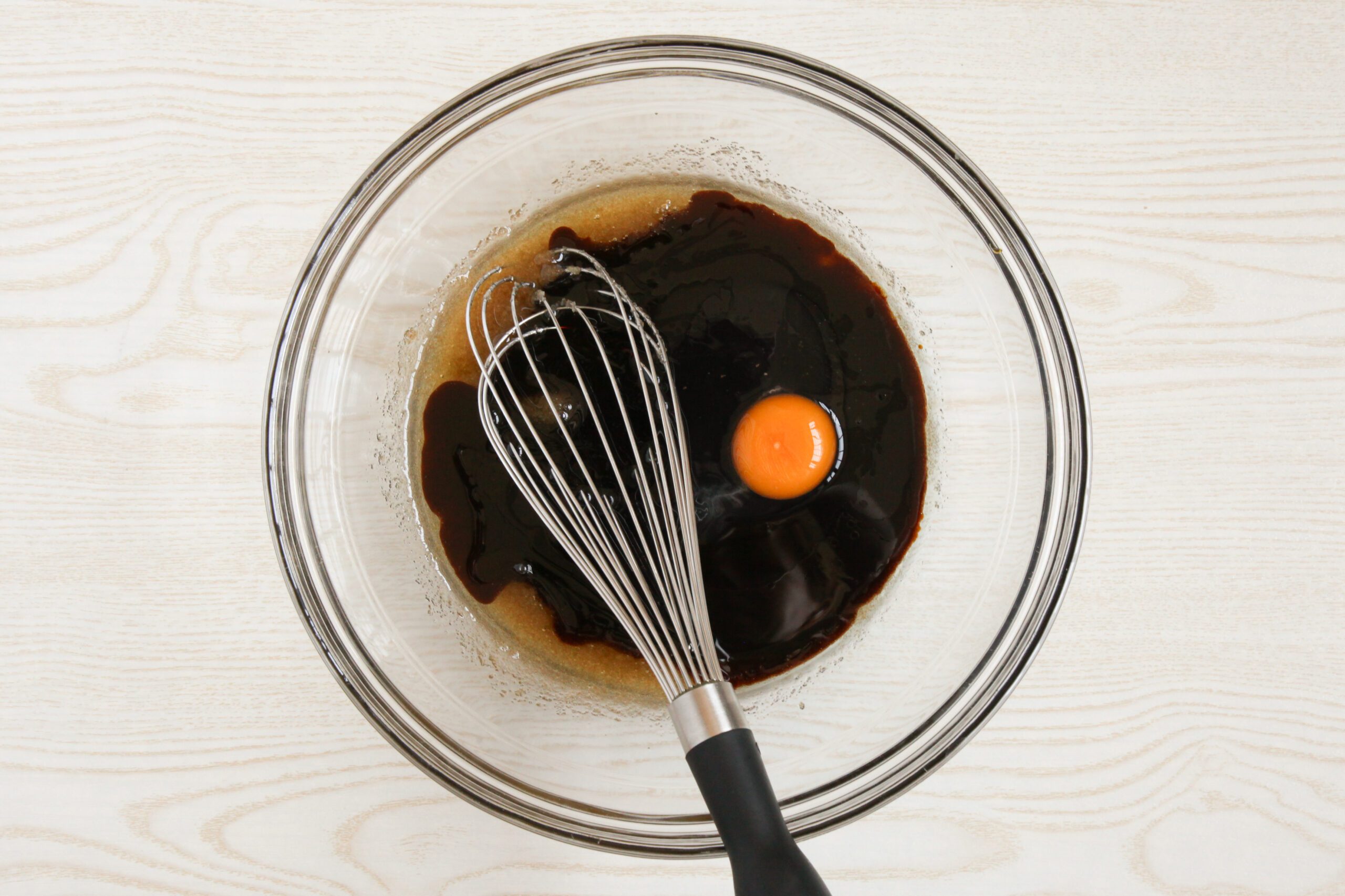 Adding molasses and egg to muffin batter