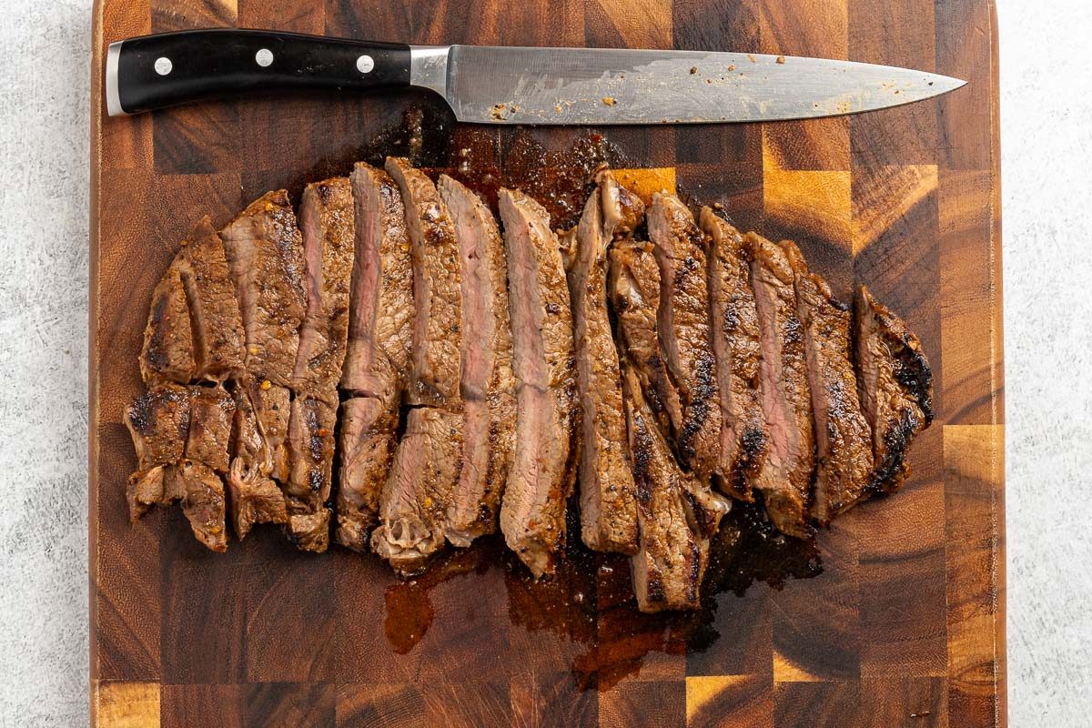 Taste of Home Grilled Flat Iron Steak recipe photo of the steak sliced across the grain.