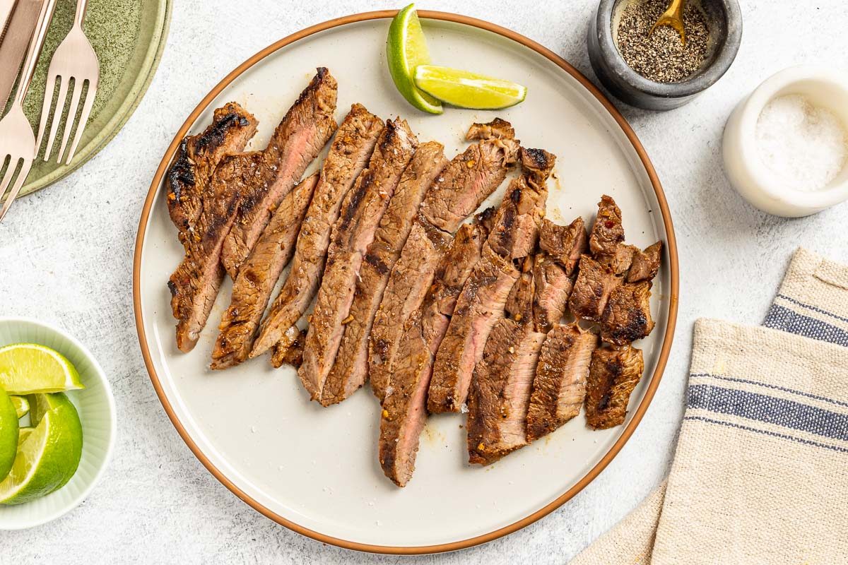 Taste Recipes Grilled Flat Iron Steak recipe photo of the finished recipe on a serving plate.