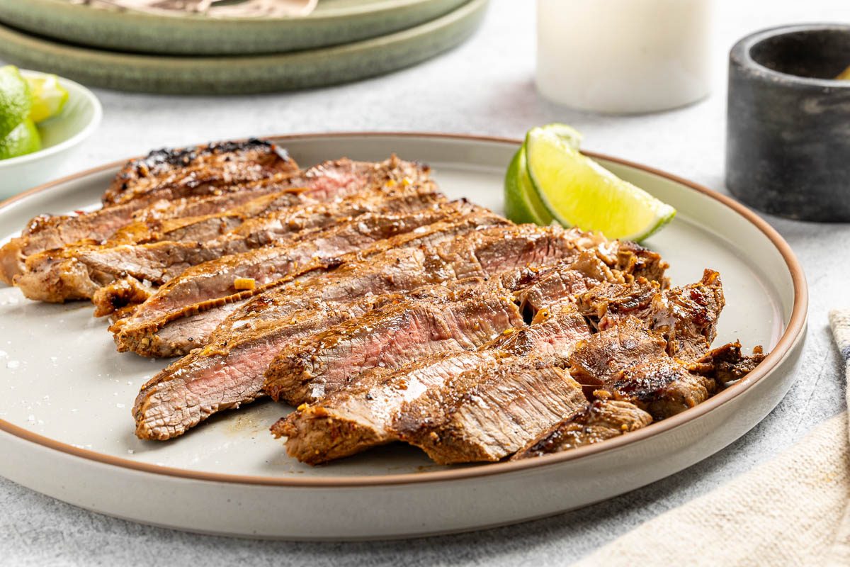 Taste of Home Grilled Flat Iron Steak recipe photo of the finished recipe on a serving plate.