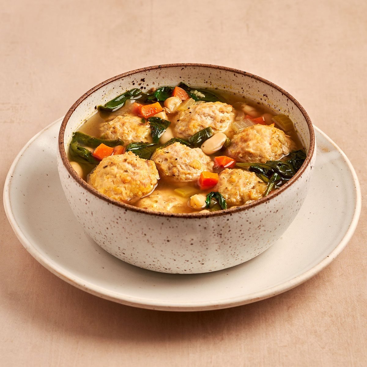 Chicken meatball soup by Taste of Home is a brothy, comforting bowl of vegetables with savory chicken meatballs and tender white beans.