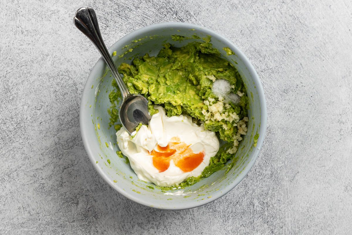 Taste of Home Mexican Burger recipe photo of the avocado spread.