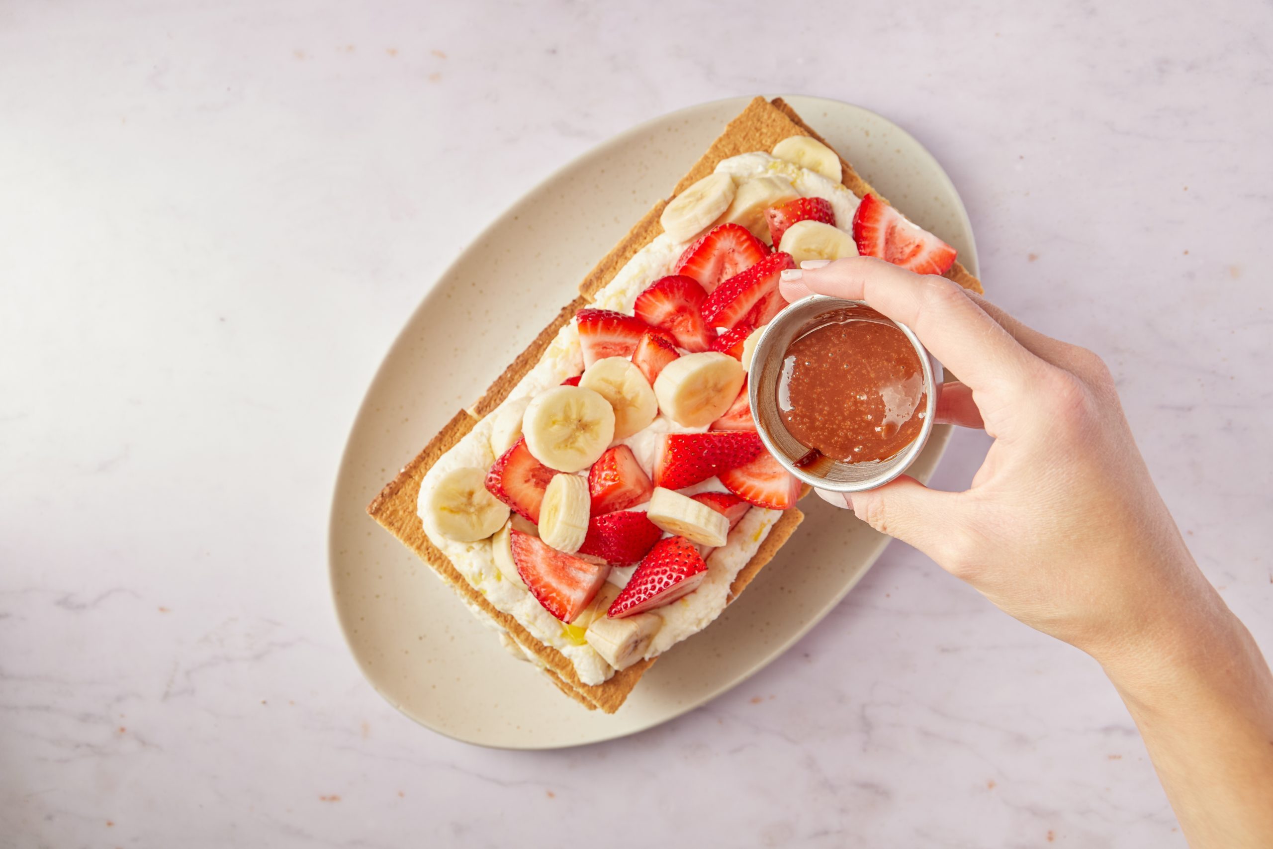 Put the finishing touches on the Banana Split Cake