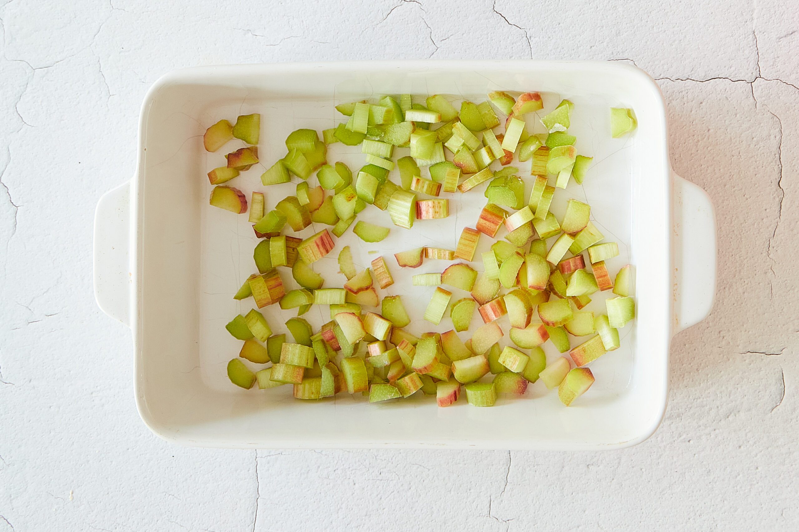 Arrange the rhubarb for the rhubarb dump cake