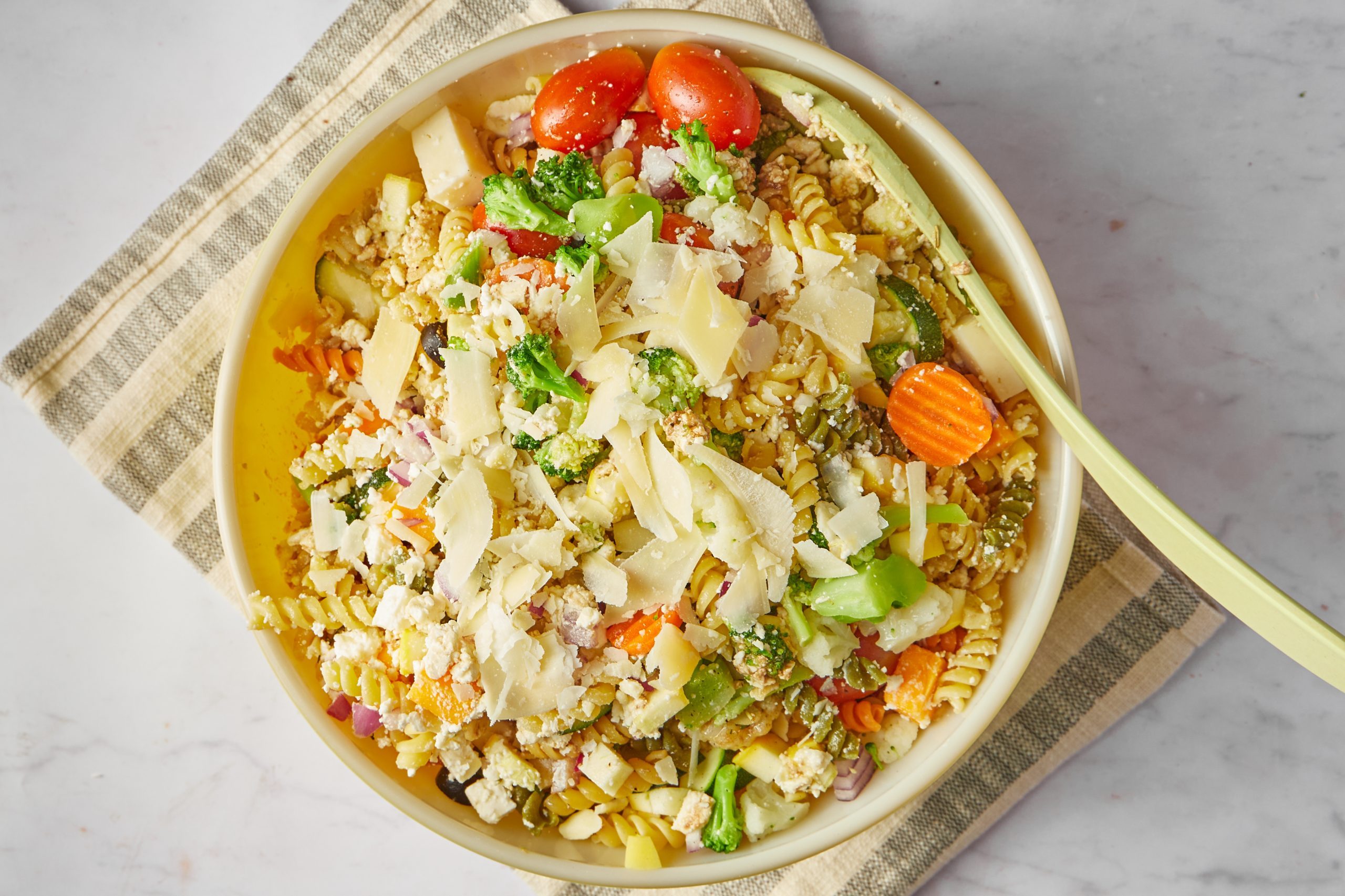 Colorful and delicious, this pasta salad with Italian dressing is a great make-ahead dish for office potlucks and large warm-weather gatherings.