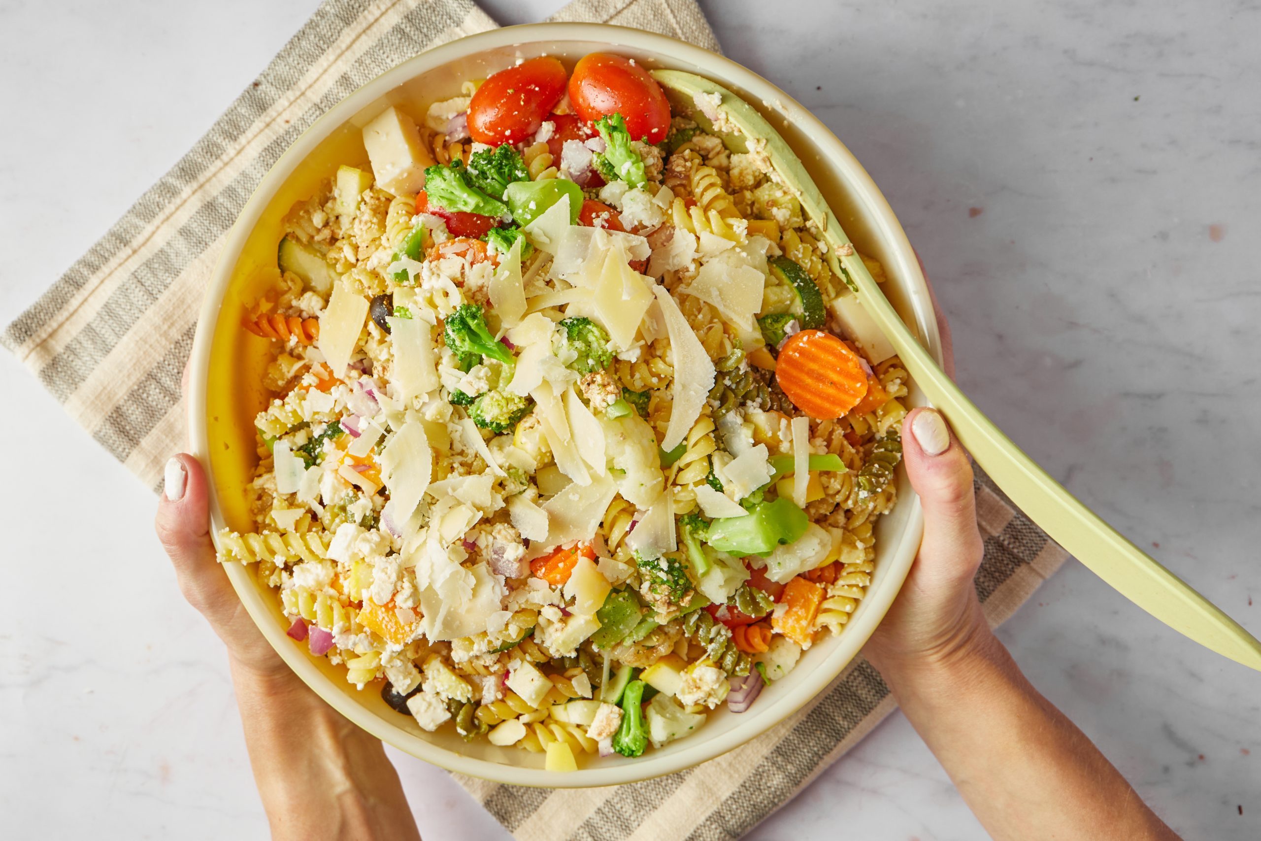 Colorful and delicious, this pasta salad with Italian dressing is a great make-ahead dish for office potlucks and large warm-weather gatherings.