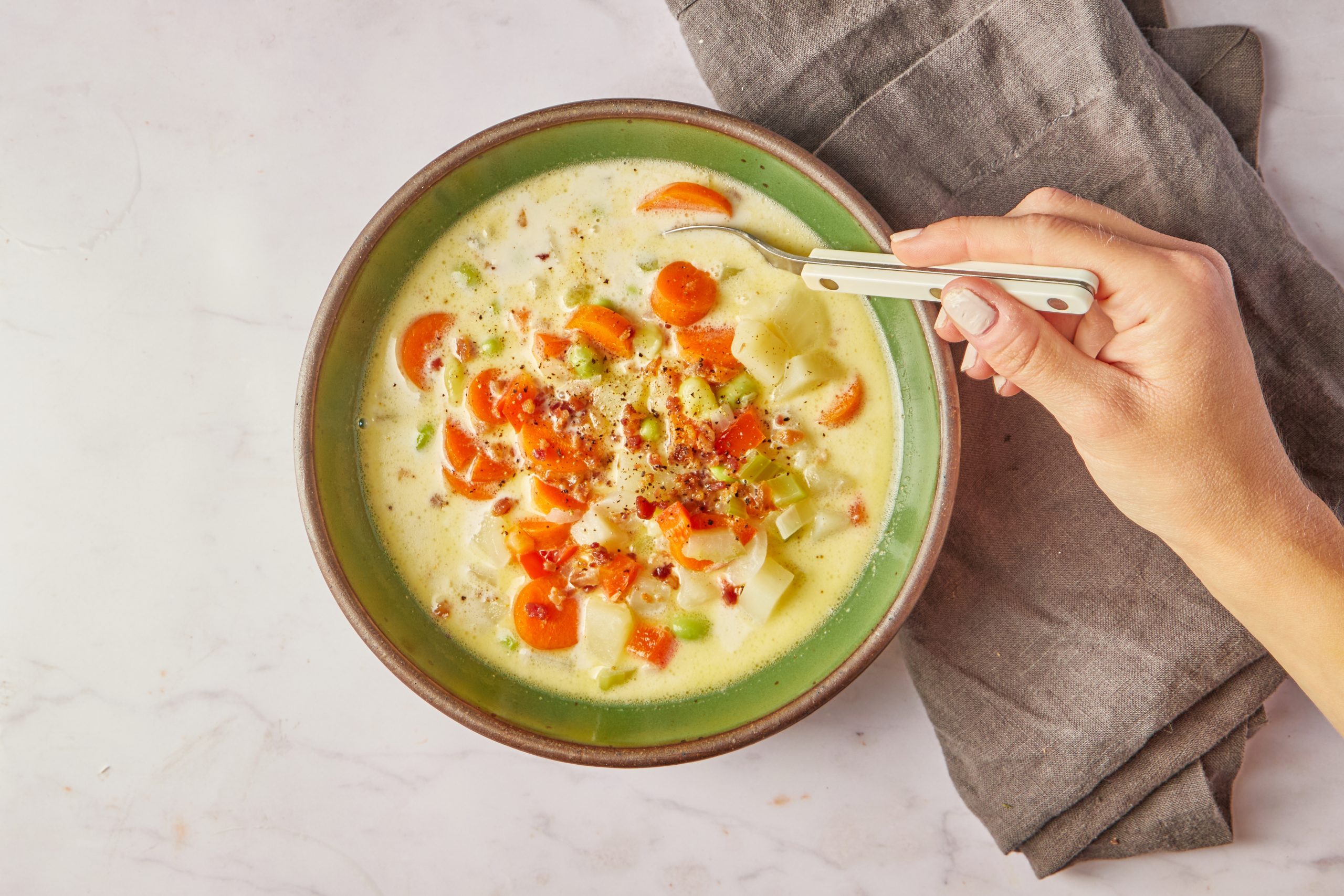 This comforting lima bean soup proves that lima beans are not to be underestimated. Buttery beans and well-seasoned veggies are the power players in this soup, topped with crispy bacon for a satisfying one-pot meal.