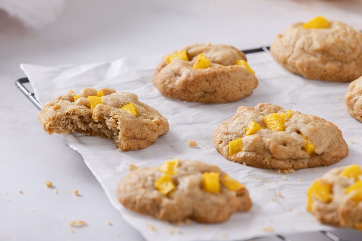 Cookies On Wire Rack Showing Inside Of One Cookie.