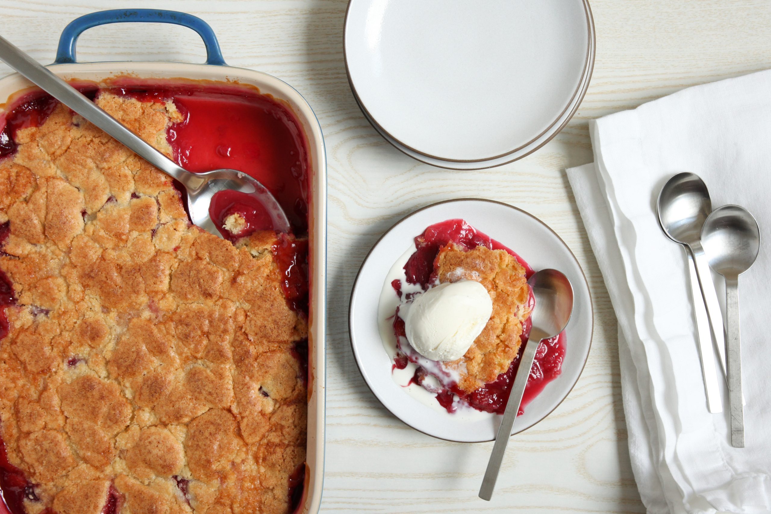 Plum cobbler being served