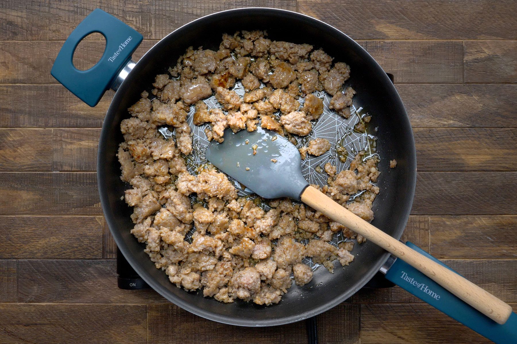 Browned and crumbled sausage in a large skillet.