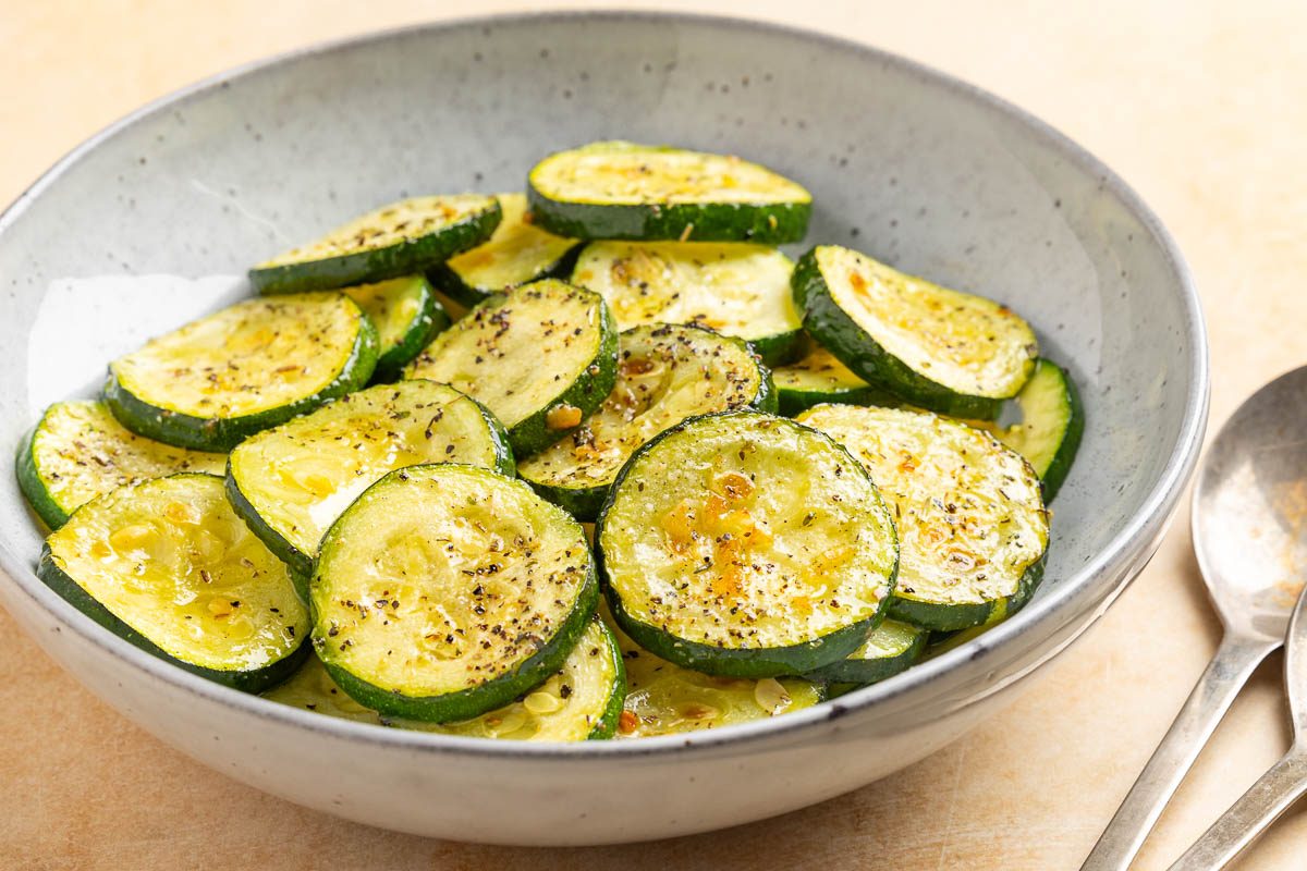 Taste of Home sauteed zucchini recipe photo of zucchini sitting in a bowl.