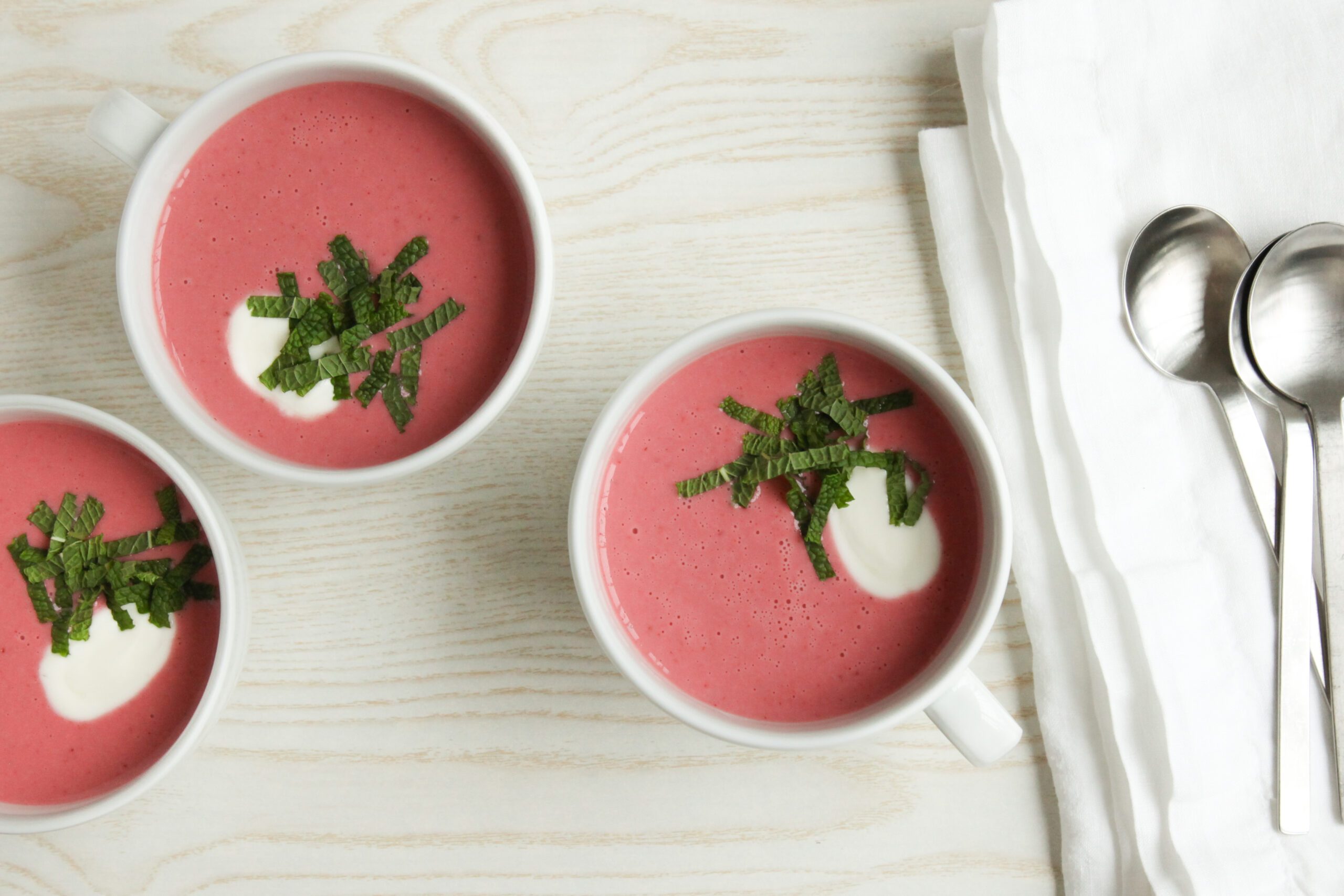 Strawberry Soup garnished with yogurt and mint