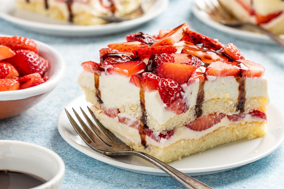 Taste of Home Strawberry Tiramisu recipe photo the finished recipe cut into slices and set on plates.