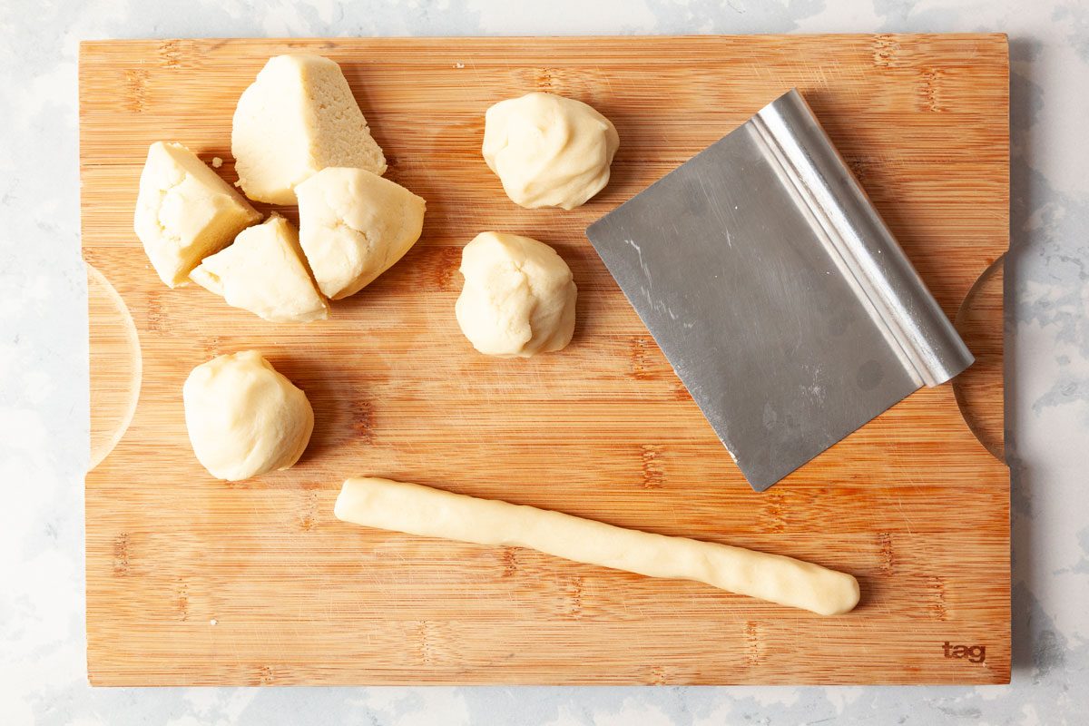 Step 2 of Taste of Home Swedish Cookies is to divide the dough into eight portions and shape each portion into a 9-inch log. Put the logs on ungreased baking sheets with about 3 inches of space between each log. Bake for about 25 minutes until the logs are lightly browned.