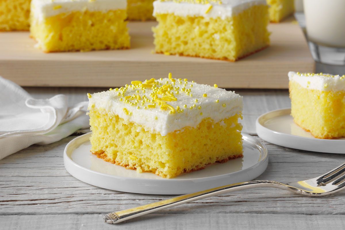 Lemon Sheet Cake slice on a plate