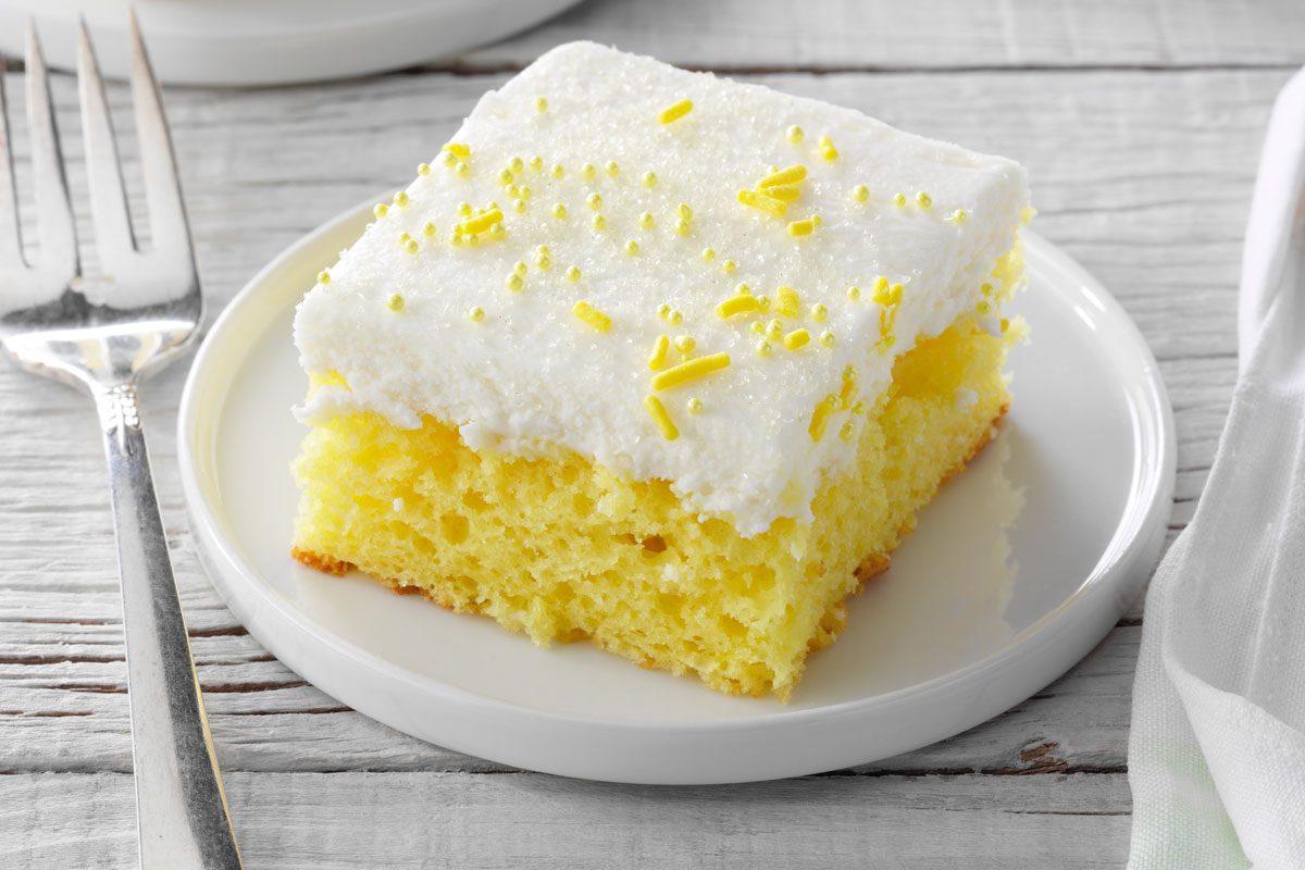 Lemon Sheet Cake slice on a plate