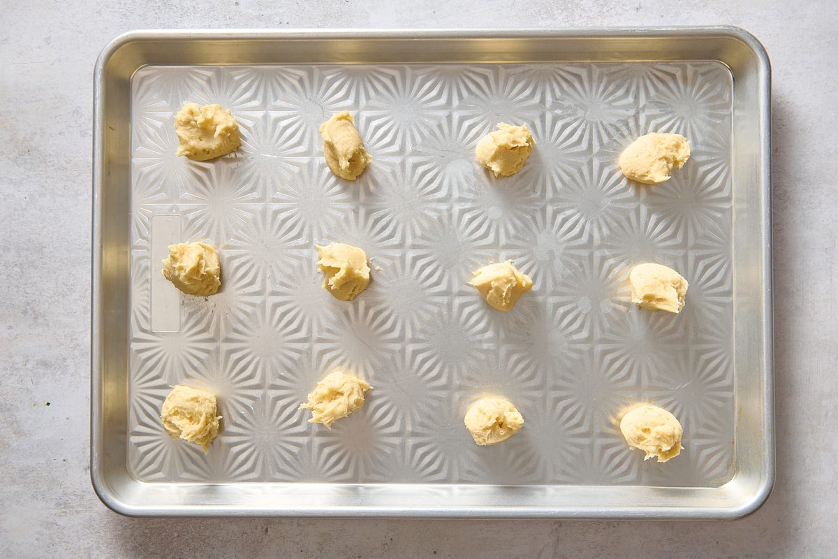 Spoonfuls of dough dropped on to a baking sheet