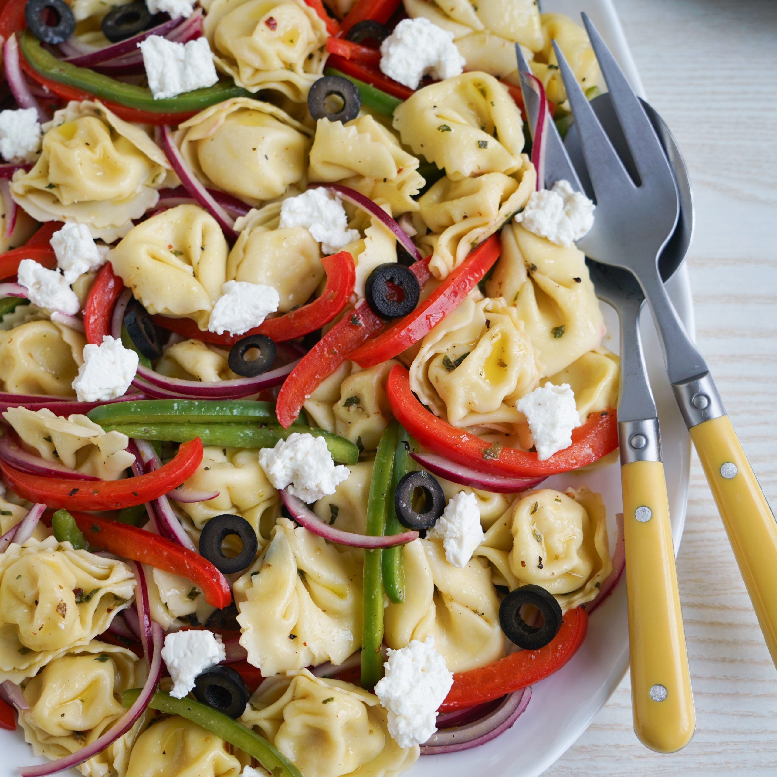 Serving tortellini pasta salad