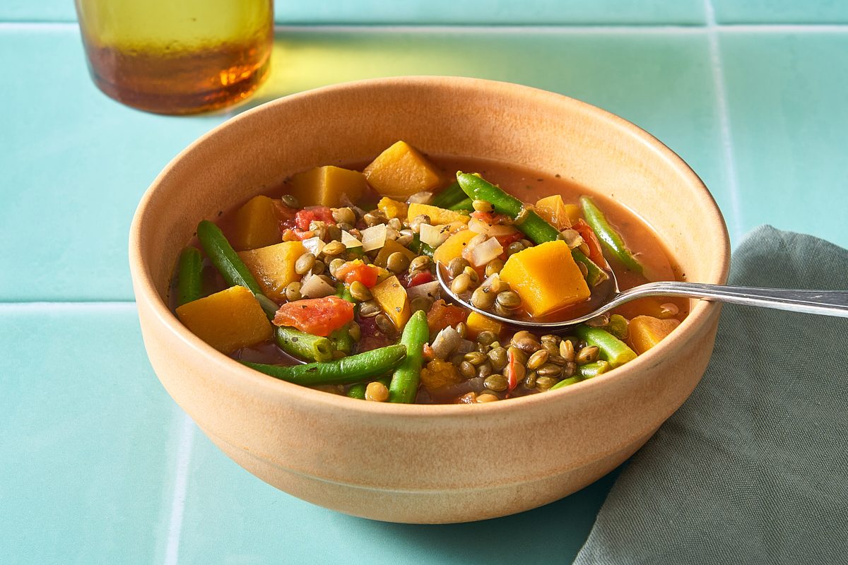 Closeup of a bowl of vegetable lentil soup