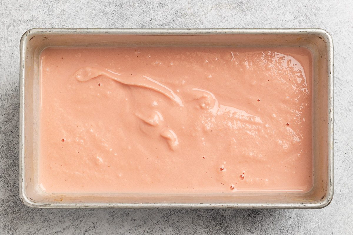 Taste of Home Watermelon Ice Cream recipe photo of the ice cream in a 9 x 5 loaf pan.