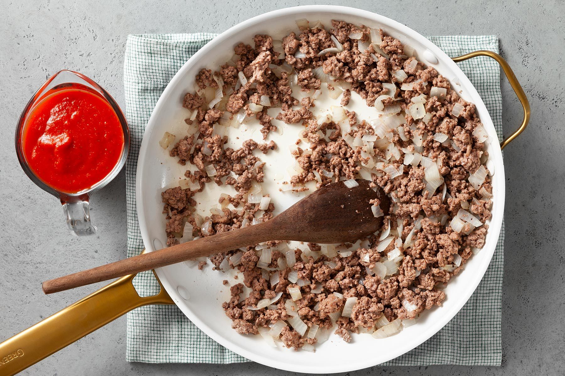 cook beef and onion in a large saucepan