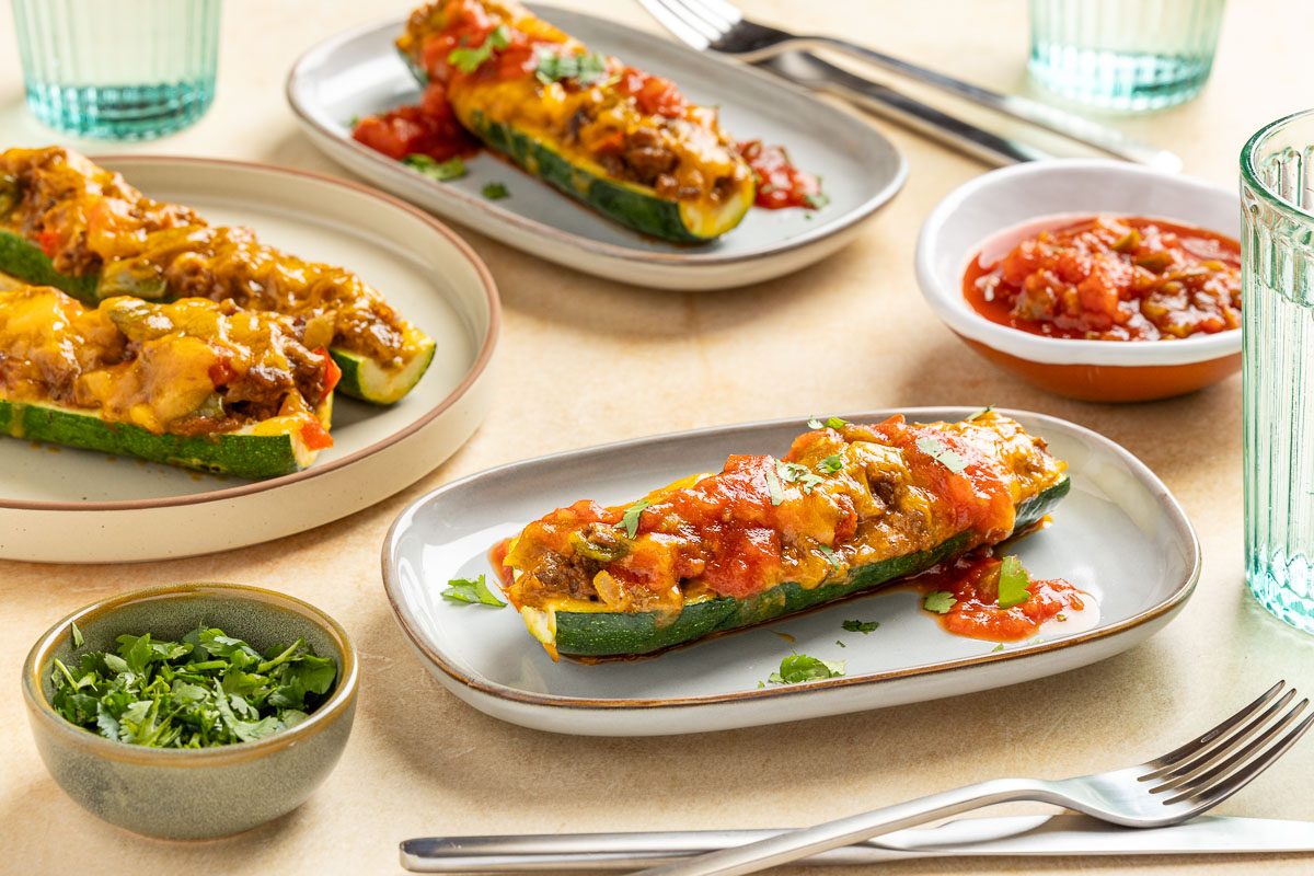 Taste of Home Zucchini Taco Boats recipe photo of the finished recipe served on plates.