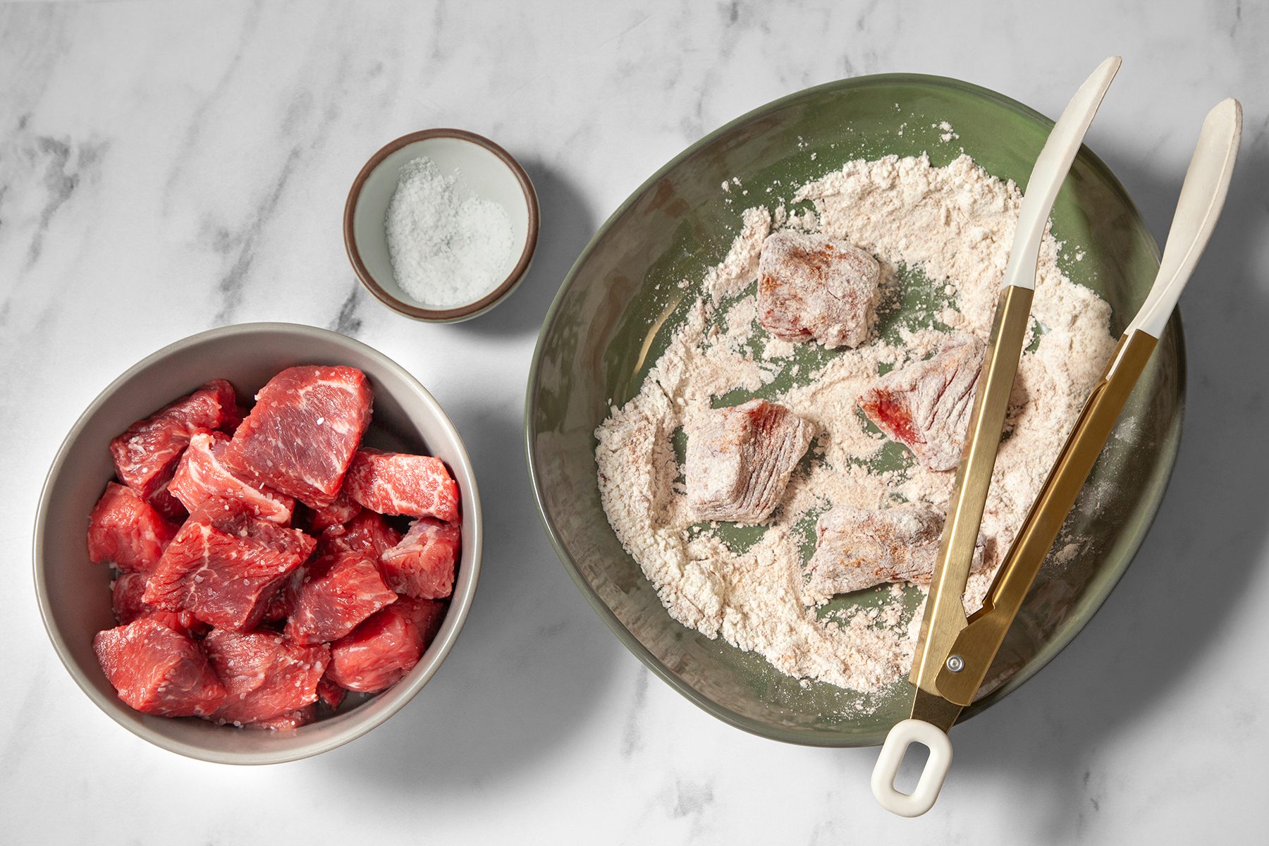 Top view of a kitchen counter with ingredients for cooking. 