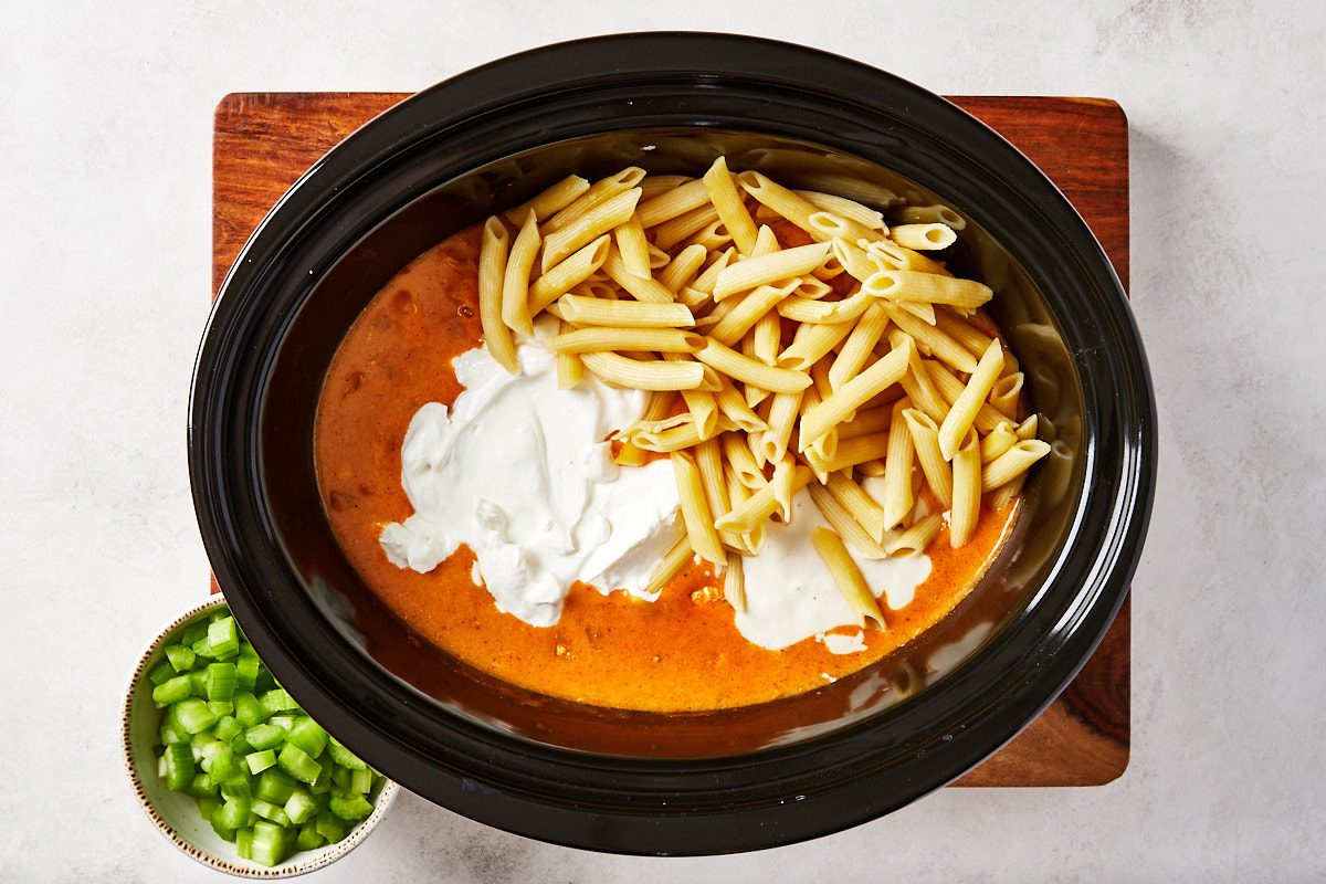 Buffalo Chicken Pasta Step 3- remaining ingredients added to sauce in slow cooker