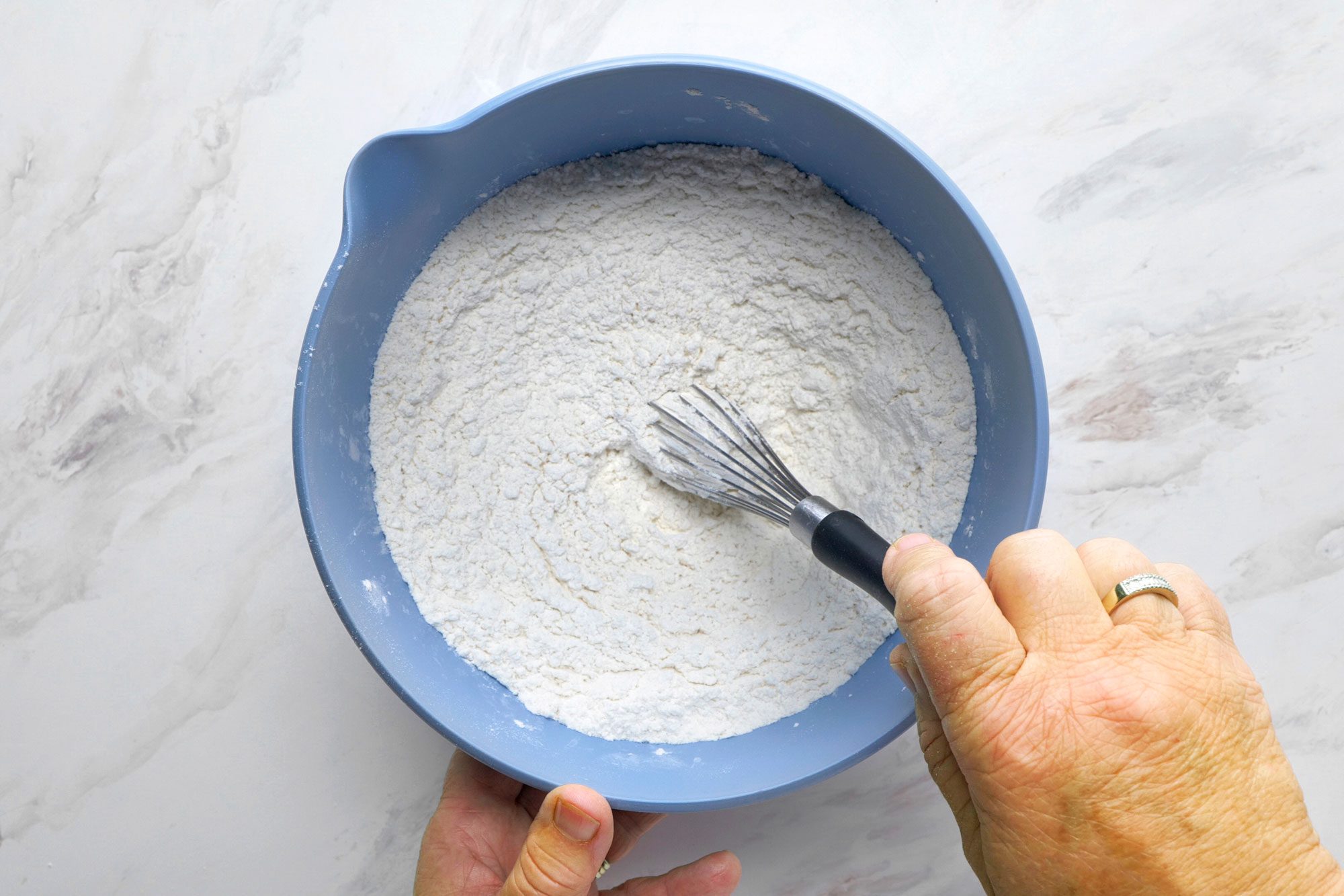 In a large bowl, combine flour, sugar, baking soda, salt and baking powder.