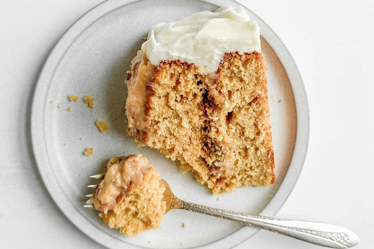 Taste of Home Butterscotch Cake on a white plate with a vintage fork