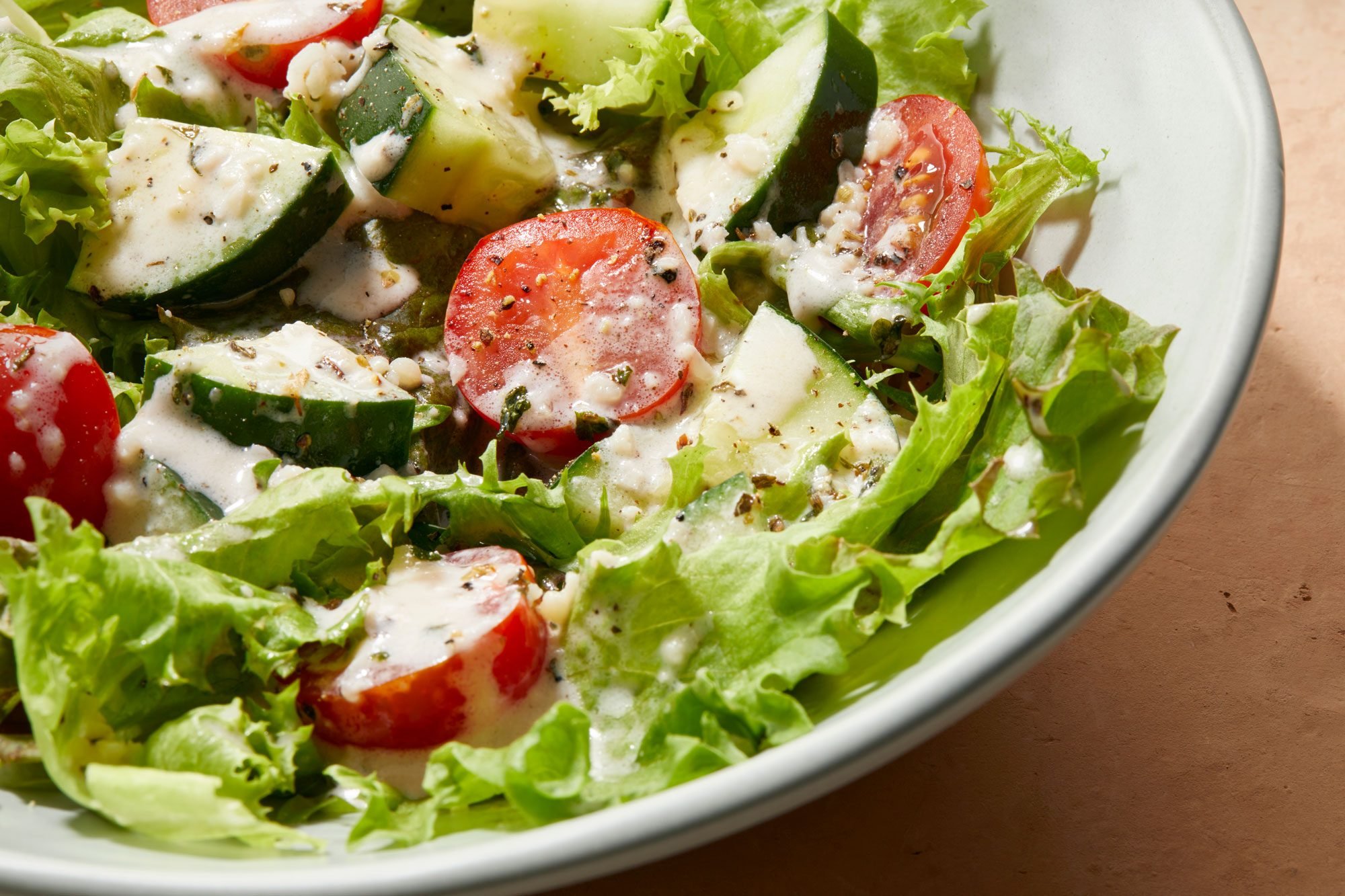 creamy italian dressing on salad