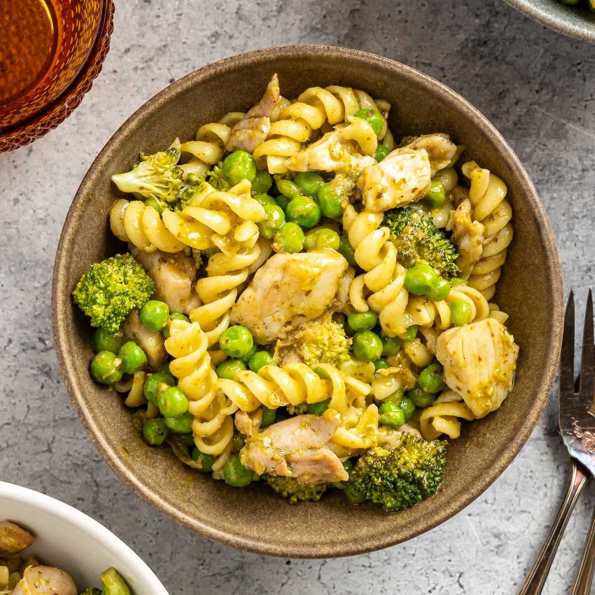 Taste of Home Chicken Pesto Pasta recipe photo of the finished recipe served in bowls.