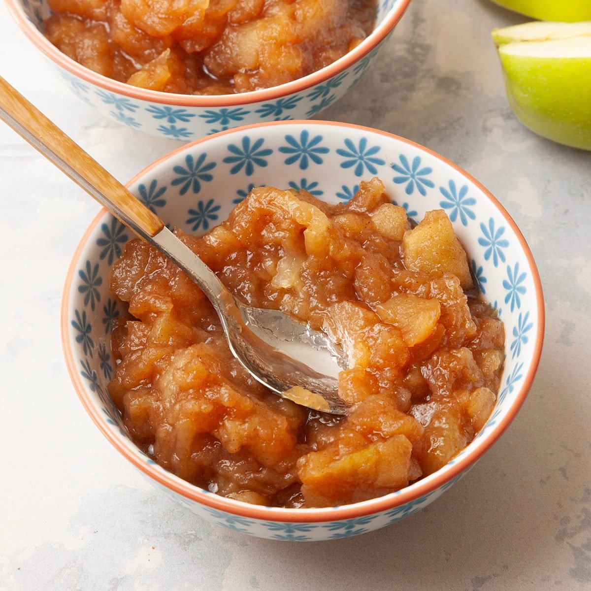 Single servings of Taste of Home Chunky Applesauce in small blue and white bowls