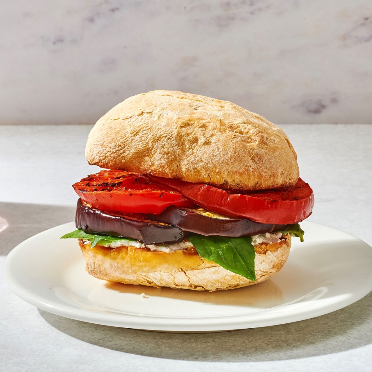 Eggplant sandwich served on a plate