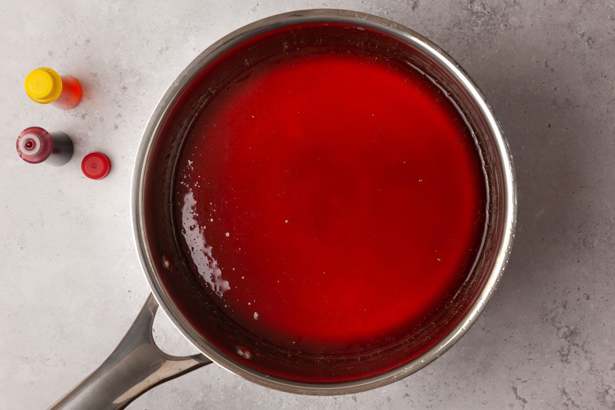 Step 3 of Taste of Home Hard Candy is to continue boiling the syrup without stirring until a candy thermometer reaches 300°F (the hard-crack stage). Remove the pan from the heat and whisk in the flavor extract and the food coloring (if desired).