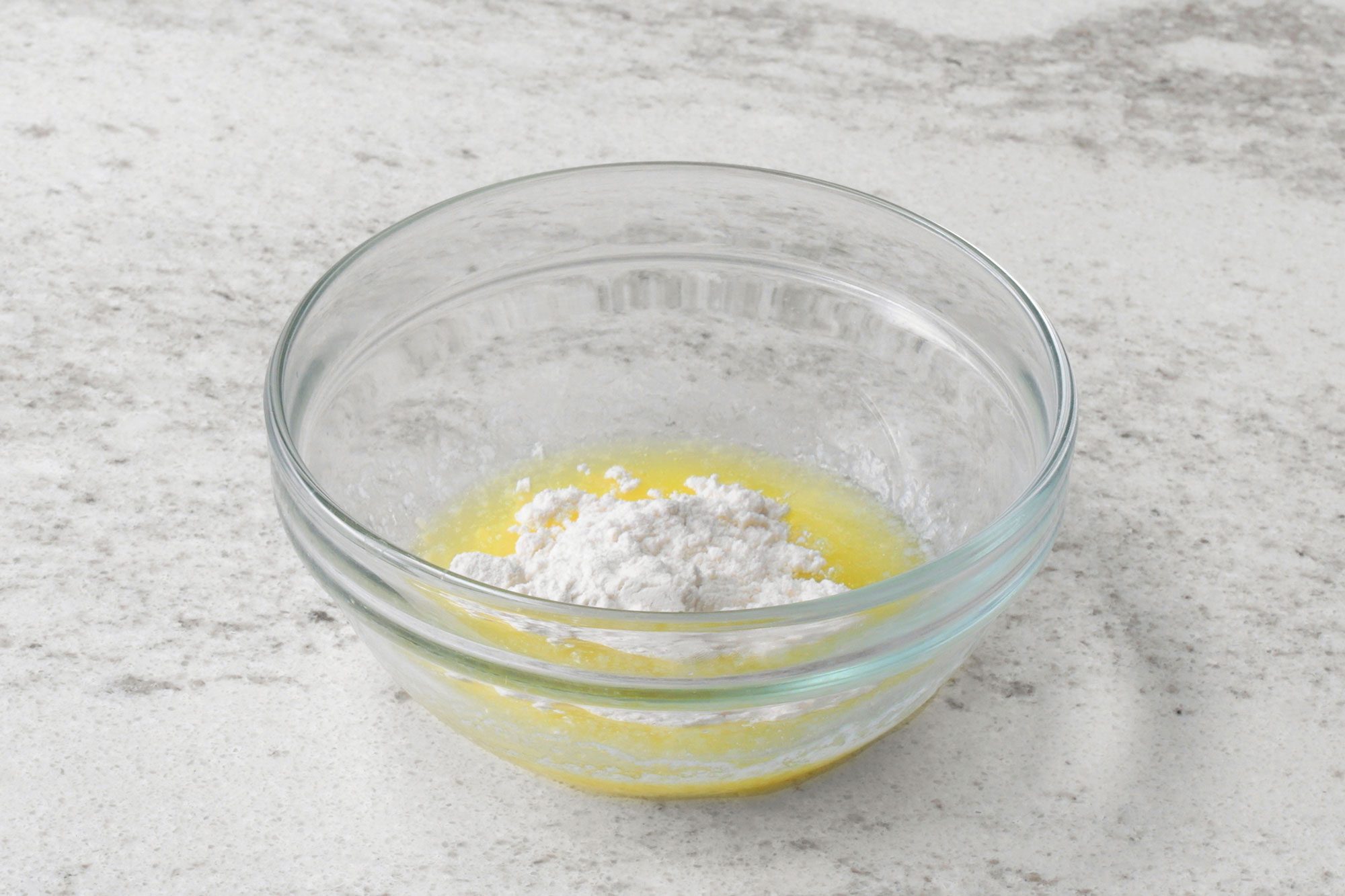 Place remaining 2 tablespoons butter in a small microwave-safe bowl.