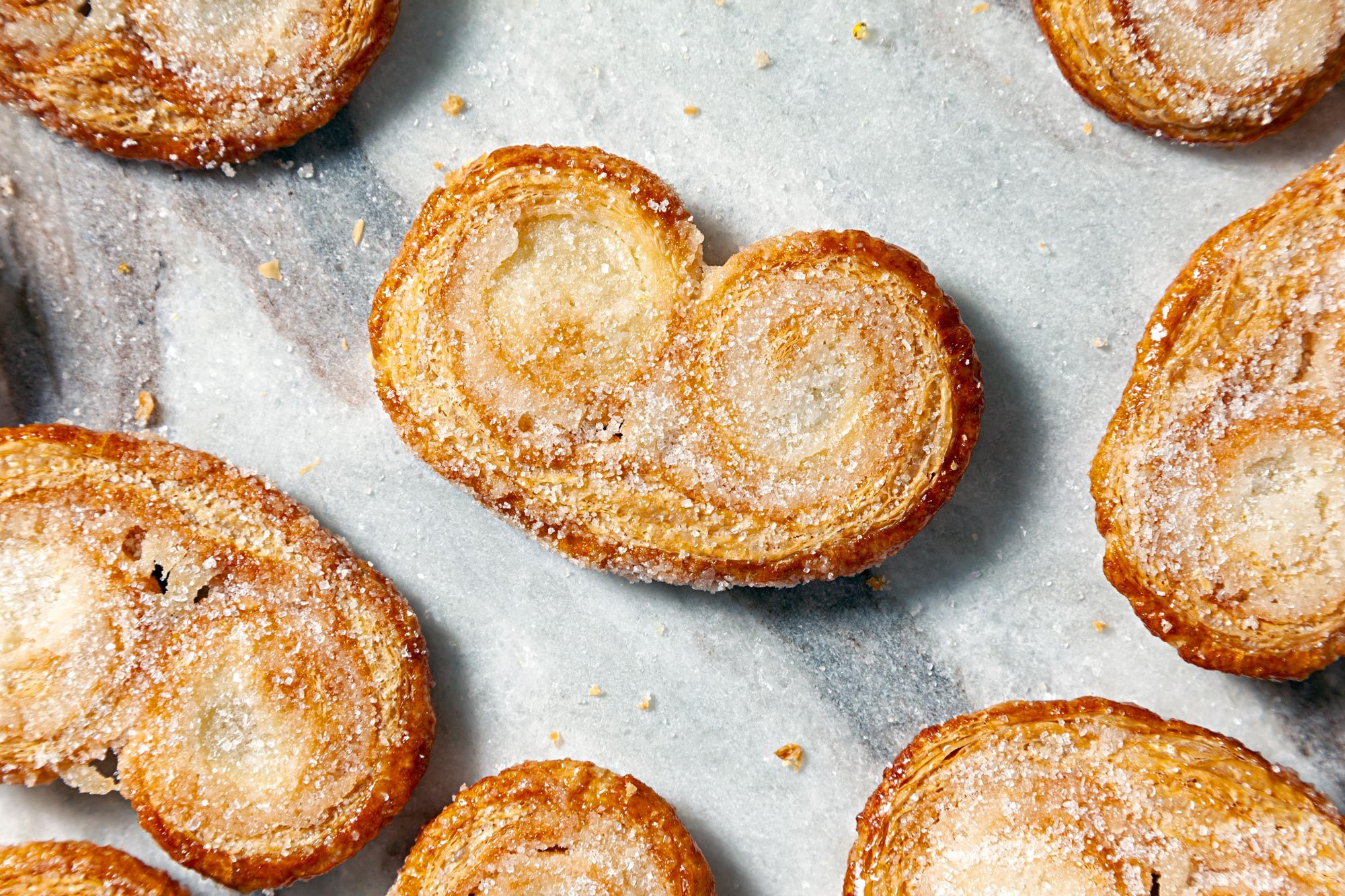 Baked Palmier Cookies placed on the marble surface